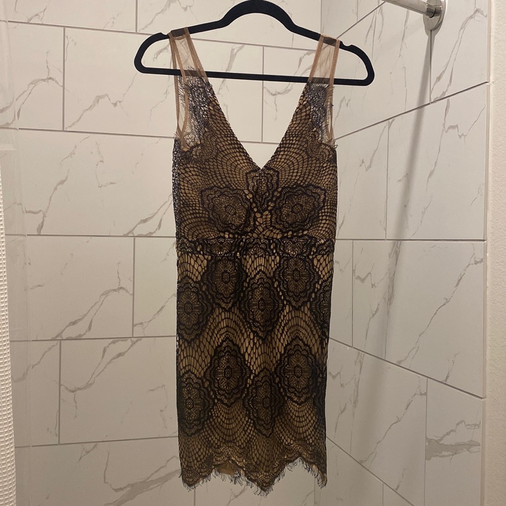 Black and nude lace mini dress. Size S. Purchased from ANGL